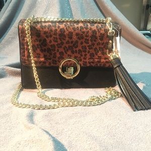 New Aldo purse. Leopard print and black gold chain